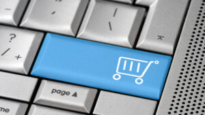 e-commerce-online-shopping-keyboard-blue-shopping-cart-button-nki